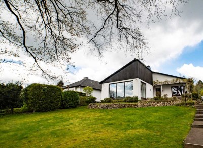 Bungalow auf traumhaften Hanggrundstück im Herzen von Sottorf dem schönsten Dorf im Rosengarten