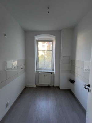 renovierte 1 Zimmer-Wohnung mit Gemeinschaftsgarten