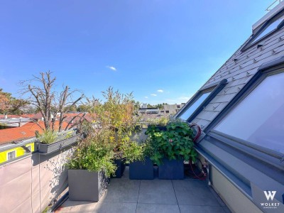 Exklusive 3-Zimmer-Dachgeschoss-Maisonette mit der Terrasse und Tiefgaragenplatz