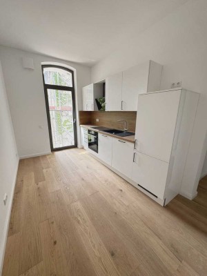 Denkmal- Effizienzhaus - kernsanierte Wohnungen mit EBK im Herzen Lindens!