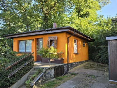 Ferienhaus mit Seeblick und tropischem Garten