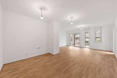 Moderner Erstbezug: Sonnige 4-Zimmer-Wohnung mit Terrasse und Garten
