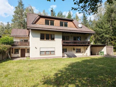 Attraktives Zweifamilien-/Mehrgenerationenhaus mit traumhaftem Blick auf Wald und Weiher