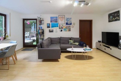 Die Sonne genießen: vermietete Souterrain-Wohnung mit eigener Terrasse und Freistellplatz