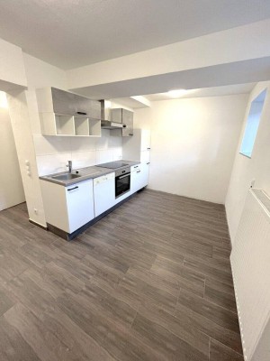 2-Zimmer-Souterrain Wohnung mit Gemeinschaftsterrasse