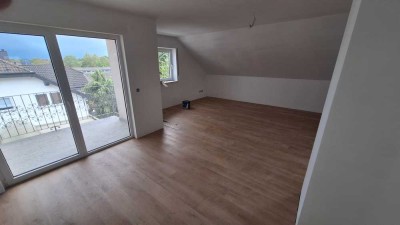 Erstbezug mit Balkon: Exklusive 3-Raum-DG-Wohnung in Bürstadt