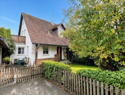 Familienglück – Charmante Doppelhaushälfte mit Gartenidylle.