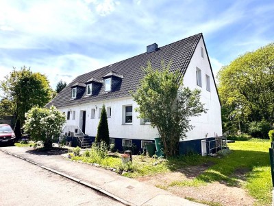 3 Mehrfamilienhäuser und 20 Garagen in gutem Zustand
