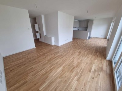 Mit dem Fahrstuhl direkt ins sonnige Penthouse mit 3 Zimmern, EBK und Fußbodenheizung