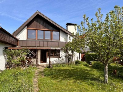 EINFAMILIENHAUS
MIT GARTEN UND GARAGE