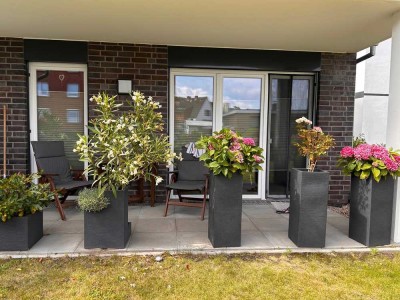 Komfortable Erdgeschosswohnung mit Einbauküche, Terrasse und PKW Stellplatz