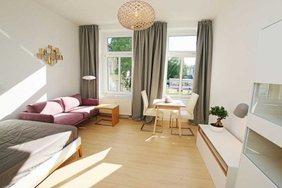 Komplett ausgestattete Wohnung mit Premium-EBK, Balkon, PKW--Stellplatz