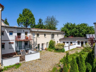 Bezugsfrei: Ruhig im Hof gelegene Maisonette-Wohnung mit Terrasse in gepflegtem 3-Seiten-Hof