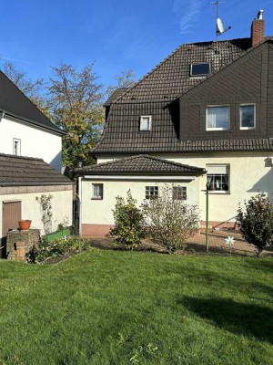 Doppelhaushälfte mit Süd-West Garten und Garage