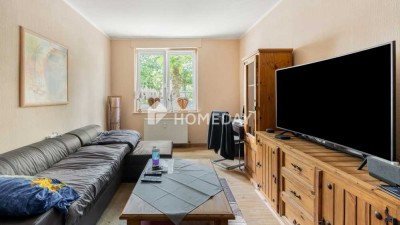 Charmante Erdgeschosswohnung mit Loggia und Gartenmitbenutzung