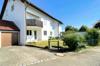 Helle 3-Zimmer-Wohnung mit 
Kachelofen, Garten und Garage