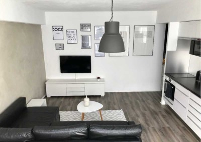 Attraktive und gepflegte 1,5-Zimmer-Wohnung mit Balkon und Einbauküche in Löbnitz