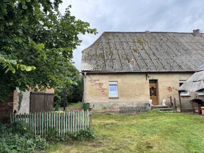 Einfamilienhaus auf einem weitläufigen, zum Teil parkähnlichen Grundstück.