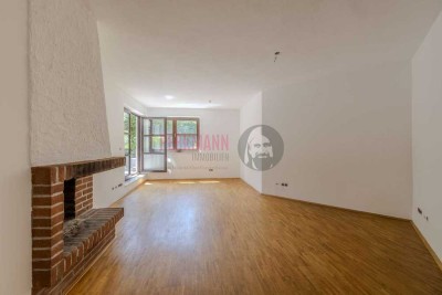 3 Zimmer Split-Level Gartenwohnung mit Sauna und Tiefgaragenstellplatz in ruhiger Lage