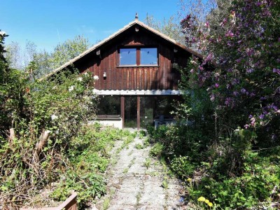 Lallinger Winkel: Bungalow m. 1.300 m2 ebenen Grundstück u. Bachlauf in naturnaher Orstrandlage!