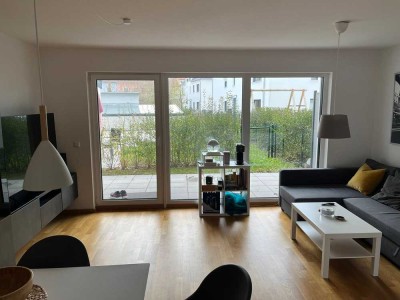 Helle und zentrale Terrassenwohnung mit Premiumküche