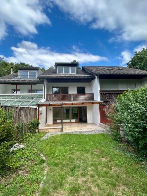 Stop! Familiengerechtes Reihenmittelhaus in Taufkirchen direkt am Wald!