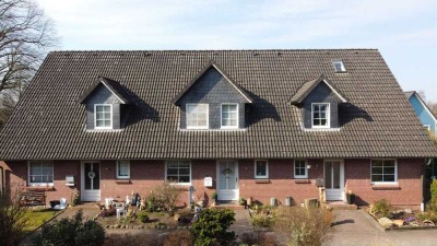 Attraktives Reihenhaus-Ensemble in Brekendorf mit 2 REH und 1 RMH mit Vierer-Carport