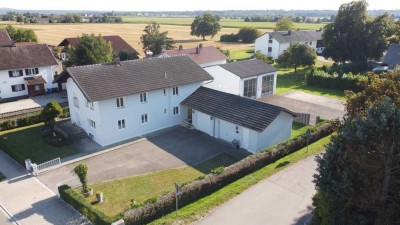 Kapitalanlage mit Potential! Zweifamilienhaus mit Garten und Doppelgarage