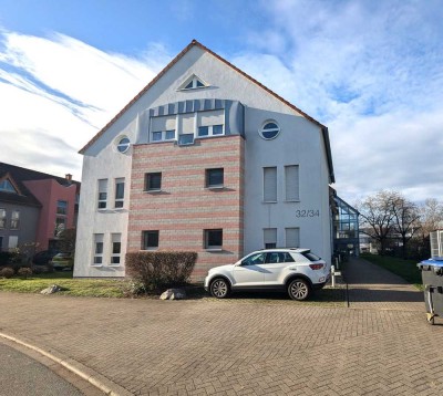 Helle Erdgeschosswohnung mit Balkon in beliebter Lage!