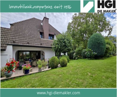 Familientraum mit Stil: Großzügiges Einfamilienhaus mit Kamin, Loggia & Garten