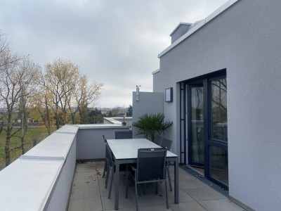 ERSTBEZUG: Schöne Dachterrassenwohnung mit Grünblick
