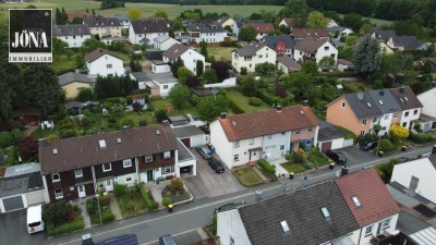 Familienfreundliches Einfamilienhaus mit Garten und Wintergartenplanung