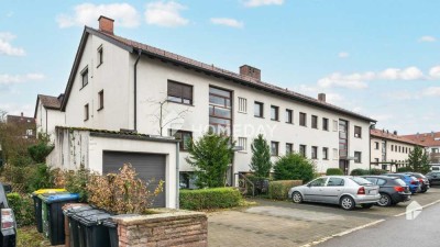 Schön geschnittene Dachgeschosswohnung mit Balkon und PKW-Stellplatz