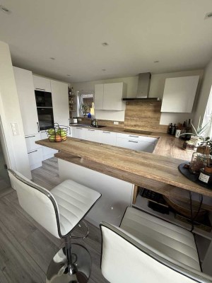 Exklusives Wohnen: Moderne 4-Zimmer-Wohnung mit XXL-Terrasse und Garten