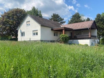 Einfamilienhaus mit großem Garten in Ruhelage und herrlichem Fernblick!