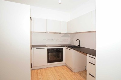 2-Raum-Wohnung mit Südbalkon, Außenstellplatz & Einbauküche - barrierefrei & energieeffizient