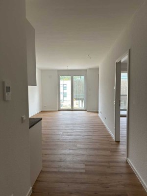Neubau mit Balkon und Einbauküche: Stilvolle 2,5-Zimmer-Wohnung mit geh. Innenausstattung