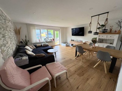 Wunderschöne Wohnung in beliebter Lage mit traumhaftem Garten und Einzelgarage