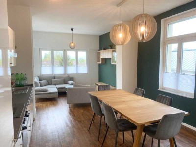 Wunderschöne 2-Zimmer-Wohnung mit Balkon in kernsaniertem Altbau im Rastatter Zentrum