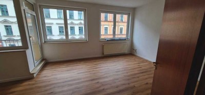 Vollständig renovierte 1-Zimmer-Wohnung mit Balkon und Einbauküche in Leipzig