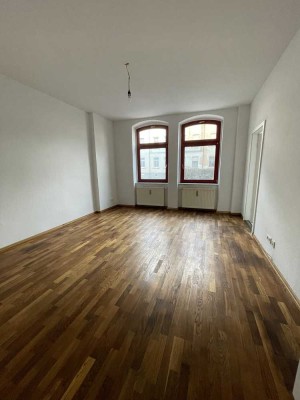 Geräumige Erdgeschosswohnung mit Balkon