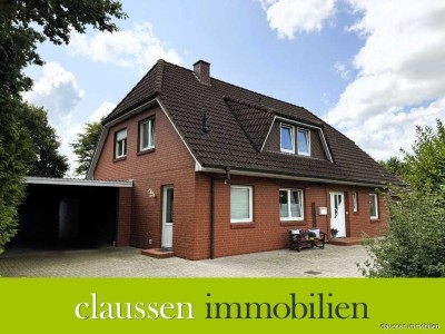 Viel Platz in idyllischer Feldrandlage – Zweifamilienhaus mit XL-Carport