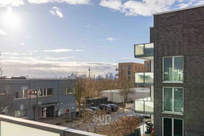 Lichtdurchflutete, geräumige 3-Zimmer-Wohnung mit Südbalkon und exklusiver Miele-Einbauküche