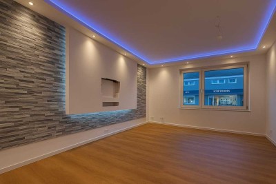 YENER Immobilien - Kernsanierte Maisonettewohnung mit großzügiger Garage