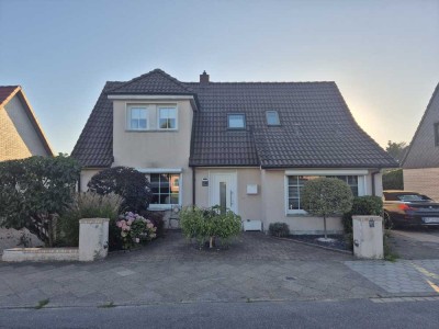 3,5 Zimmer Erdgeschosswohnung mit Garten und Garage