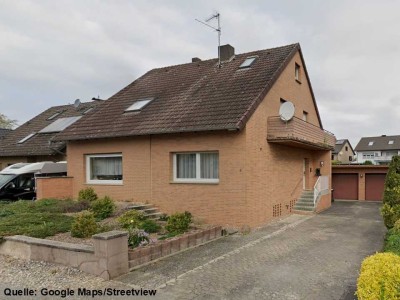 Vielseitiges Ein- bis Zweifamilienhaus mit Garagen in ruhiger Lage von Bad Salzuflen-Holzhausen