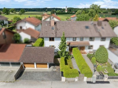 Sauerlach: Zweifamilienhaus mit sonnigem Garten