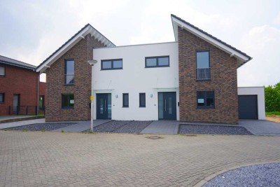 Luxuriöse Doppelhaushälfte mit viel Wohnraum und Garten