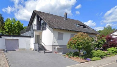 Idyllisches Einfamilienhaus mit Einliegerwohnung und traumhaftem Garten