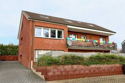 Natur pur: Freistehendes Einfamilienhaus mit Einliegerwohnung, Terrasse + Garten, Balkon und Garage